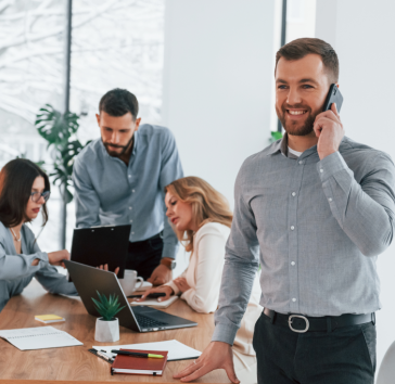 man-with-phone-group-of-business-people.png man-with-phone-group-of-business-people.png